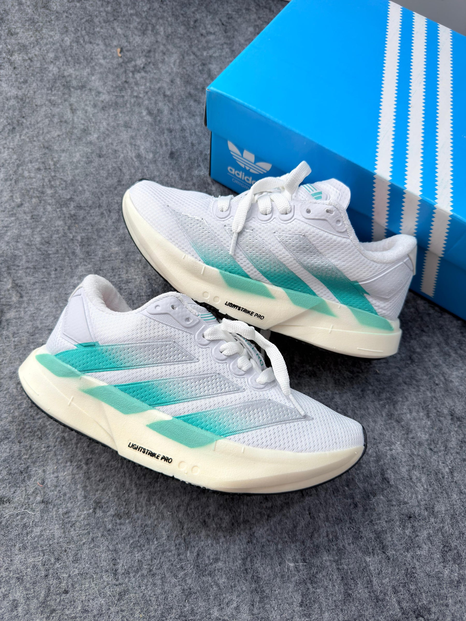 Adios Pro 4 - Branco/Azul